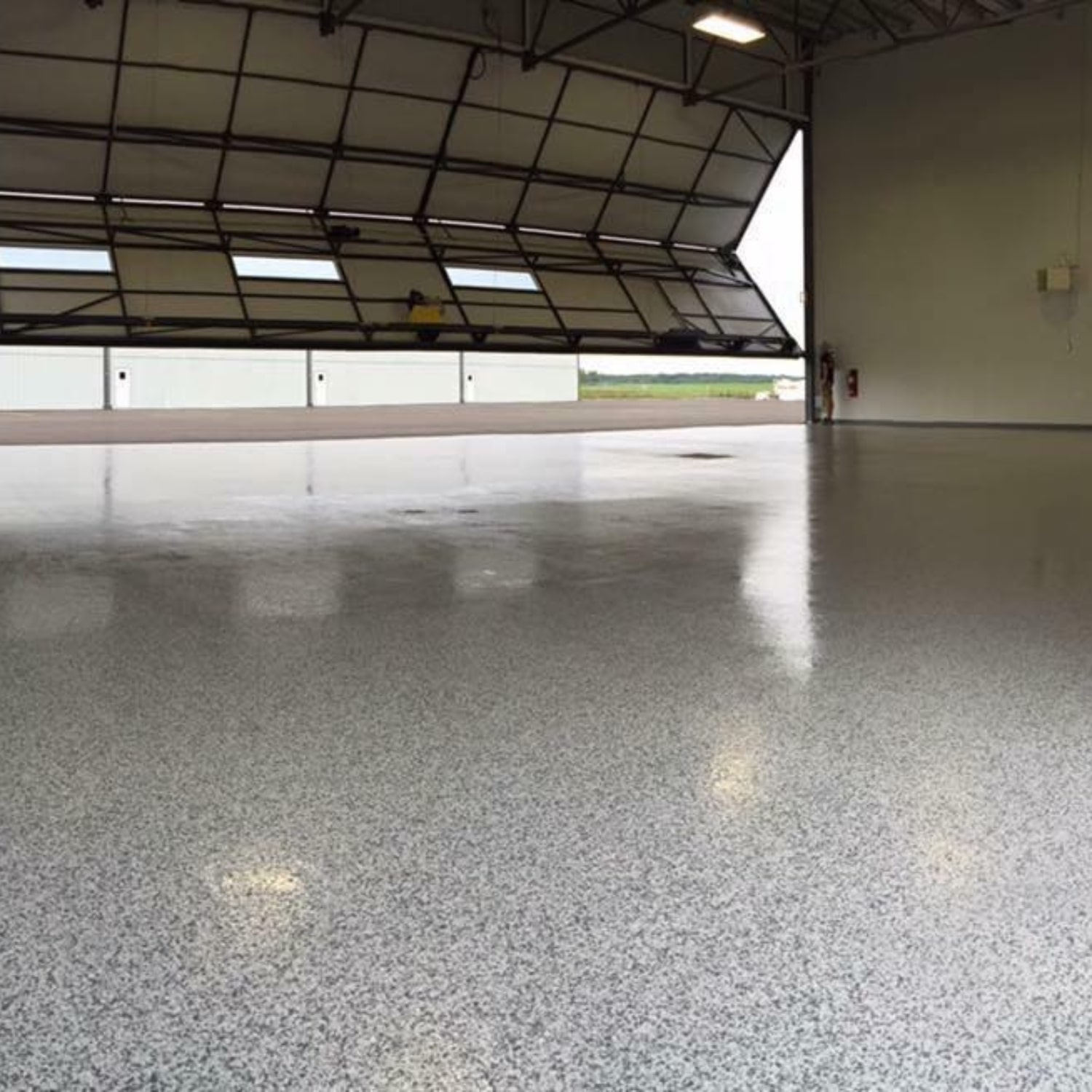 Airplane Hangars Industrial Floor Coating by Zone Garage OKC-min